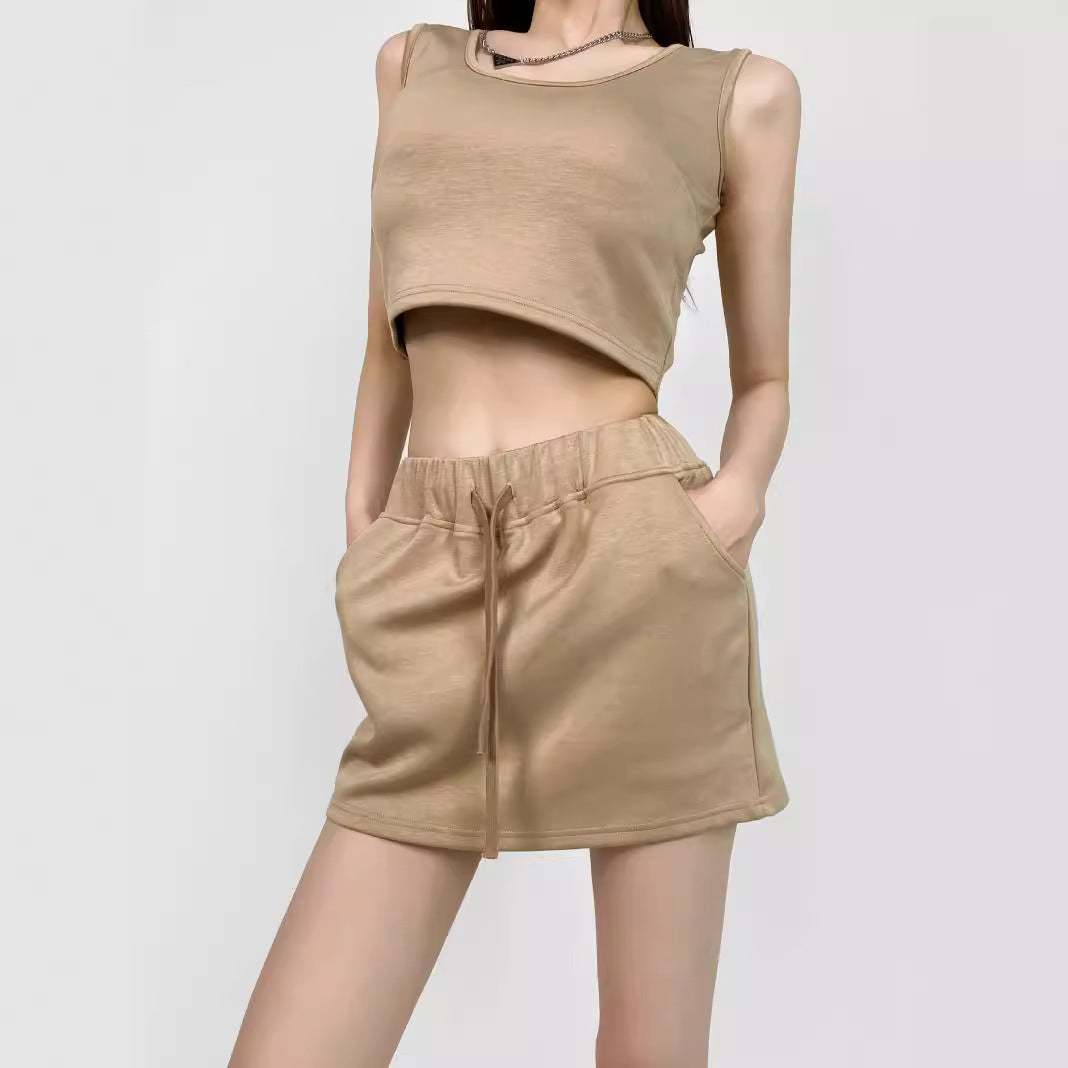 Tailored short vest with chest cushion and drawstring high waisted skirt